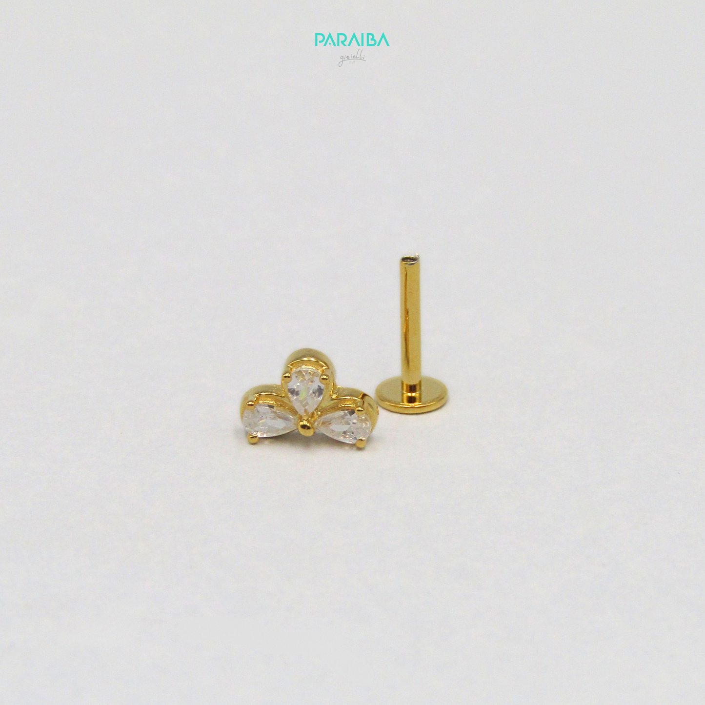 Orecchino piercing 3 zirconi goccia