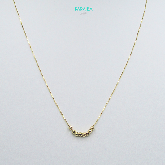 Collana con palline disco centrali