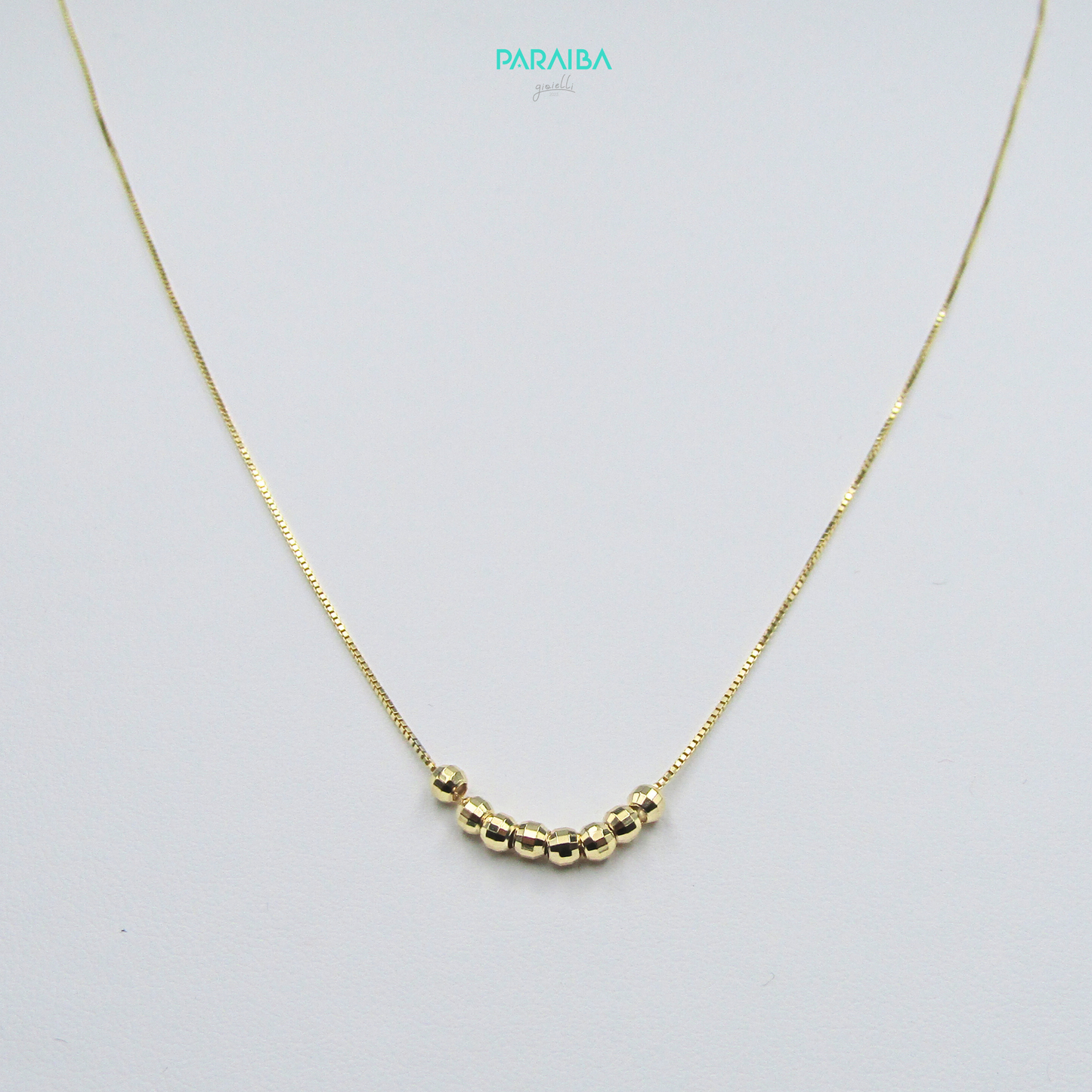Collana con palline disco centrali