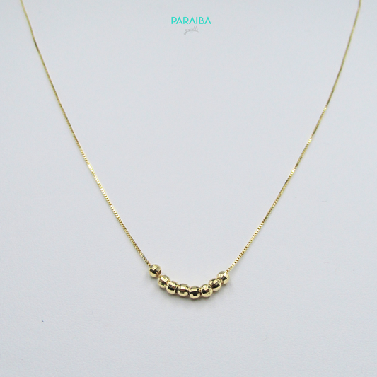 Collana con palline disco centrali