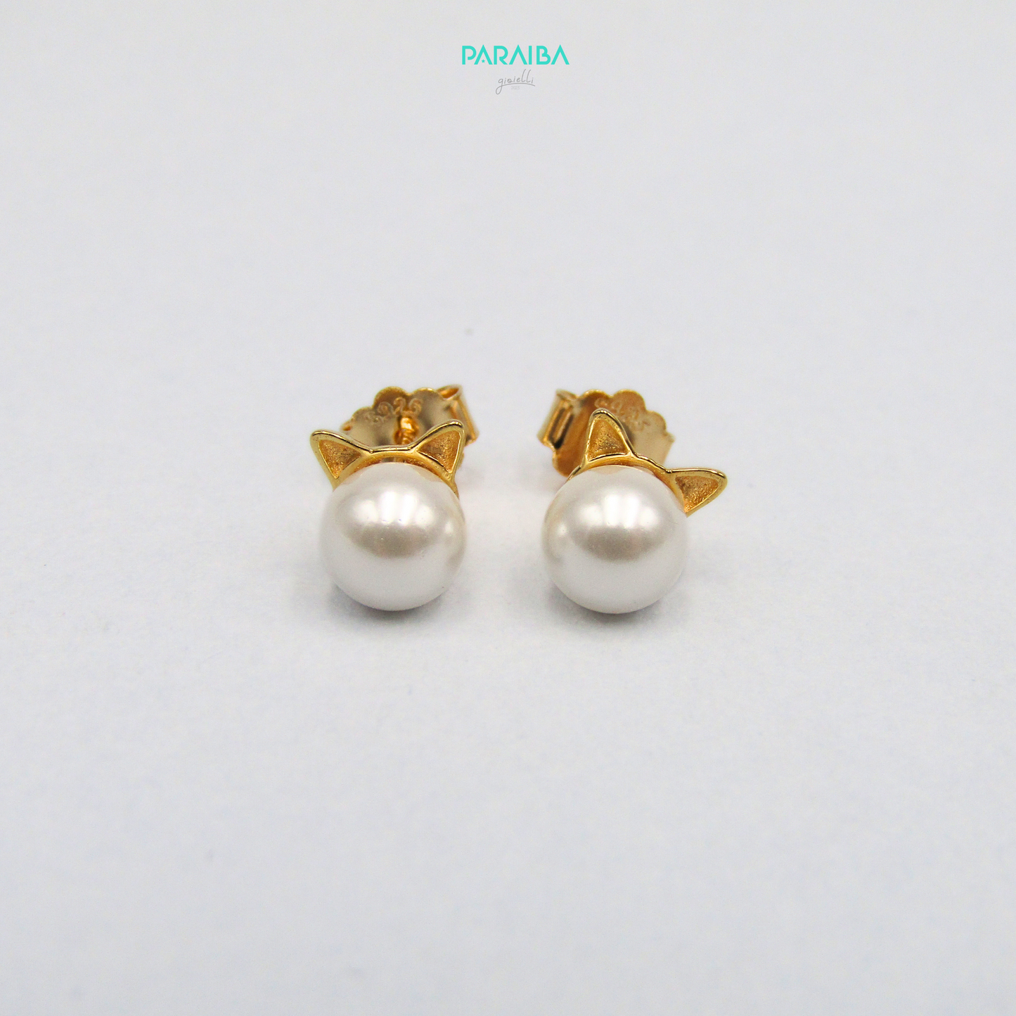 Pearl and cat ear stud earrings