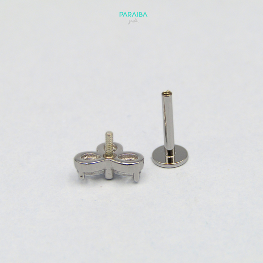 Orecchino piercing 3 zirconi goccia